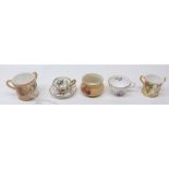 Mixed Lot: two Royal Worcester floral blush miniature three-handled tygs; a miniature Worcester