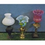Mixed Lot: three oil lamps, one with frilled floral shade, one with white opaque glass shade and the
