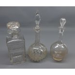 Mixed Lot: two clear glass onion-shaped decanters and a further rectangular cut glass spirit