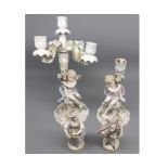 Mixed Lot: two late 19th or early 20th century continental cherub decorated candelabra bases,