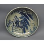 Chinese circular dish, decorated with figure by riverside, 4 character mark to reverse, 7" diameter