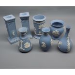 Mixed Lot: six pieces Wedgwood blue Jasperwares, comprising five various vases and a pair of