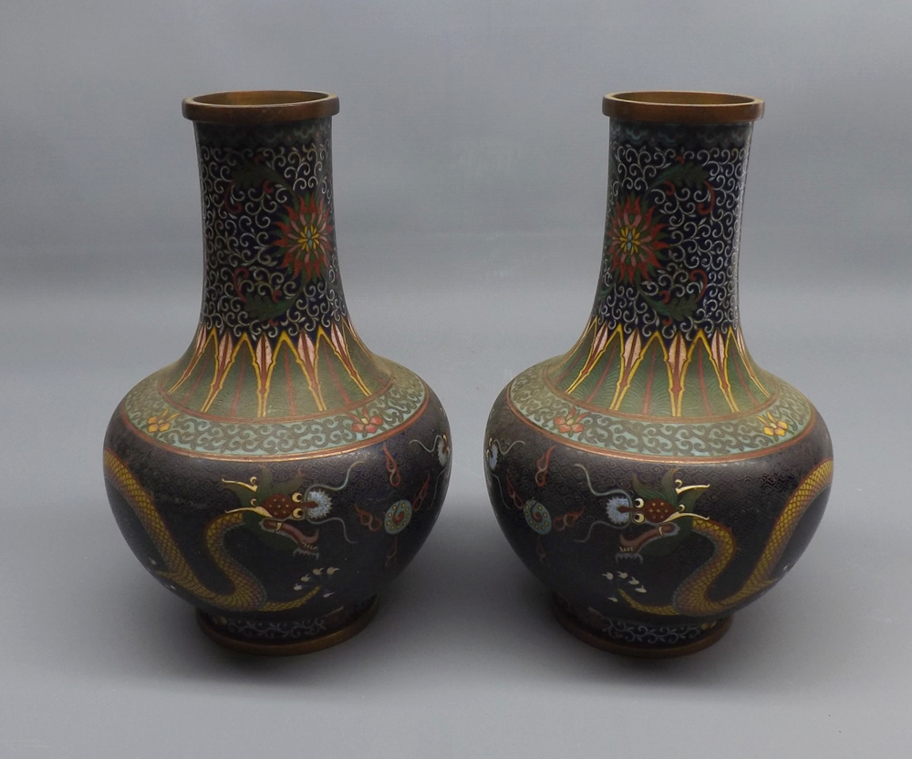 Pair of 20th century cloisonn baluster vases, decorated with dragons etc, approx 8" high