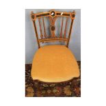 Set of four late 19th century aesthetic style spindle back dining chairs with beige upholstered