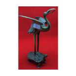 20th century Oriental model of a crane riding a tortoise, unsigned, 12" high