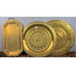 Mixed lot: one octagonal and two circular Benares type brass trays, largest 23" wide (3)