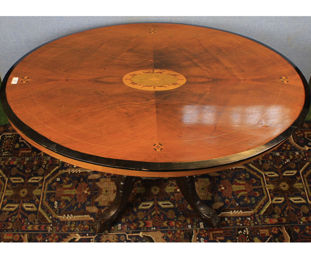 Victorian walnut and inlaid oval loo-table raised on quatre base, 47" wide
