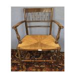 19th century rush seat spindle back carver chair 21" wide