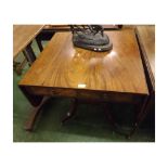 Georgian mahogany drop leaf table, two frieze drawers, raised over a turned column and quatre base