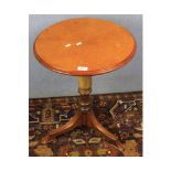 Victorian bird's eye maple veneered occasional table raised on a turned column and tripod base