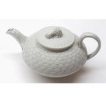 Early 19th century Wedgwood basket weave moulded teapot of compressed circular form, the cover
