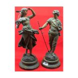 Pair of late 19th century French bronzed spelter figures, Faucheur & Faneuse, raised on turned