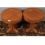 Pair of 20th century small circular oak occasional tables, 14" diameter