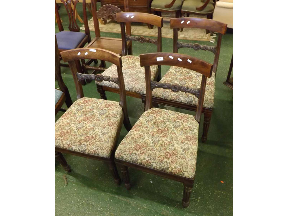 Set of four 19th century mahogany bar back dining chairs, the floral upholstered seats raised on