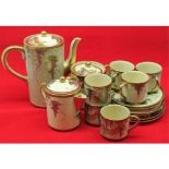 Japanese gilt decorated three-piece coffee service and accompanying cups and saucers