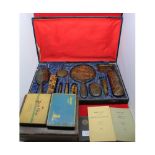 Tortoiseshell backed cased dressing table set, and further small leather case