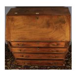 Georgian mahogany bureau of typical form, fall front, opening to an interior with pigeonholes and