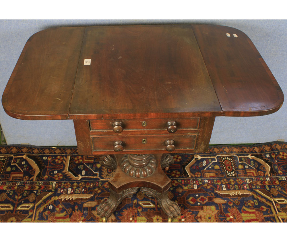 Georgian mahogany pedestal drop leaf sewing table fitted with three drawers raised on a fluted