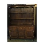 Reproduction oak dresser, the two shelf back over a three-drawer and three door base, 53" wide