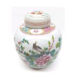 Chinese ginger jar, decorated in famille verte and rose with birds in foliage below a