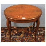 Small walnut veneered oval occasional table on cabriole legs, 20" wide