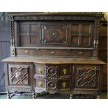 Late 19th or early 20th century oak sideboard decorated with carved barley twist and mitres