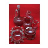 Mixed lot comprising: cranberry glass wares to include two decanters, single jug, two circular