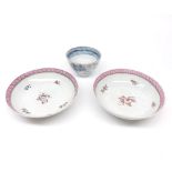 Pair of small 18th century saucers, English, Newhall, decorated with pink border and floral