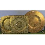 Mixed lot: three Benares type brass trays, one of circular form, the other square, decorated with