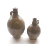 Two 18th century salt glazed bottles, largest 12" high (2)