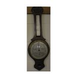 Early 20th century mahogany cased barometer thermometer combination with carved detail