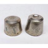 Two unusual cast metal button moulds, of cylindrical form, one marked H A Churns Harford Street