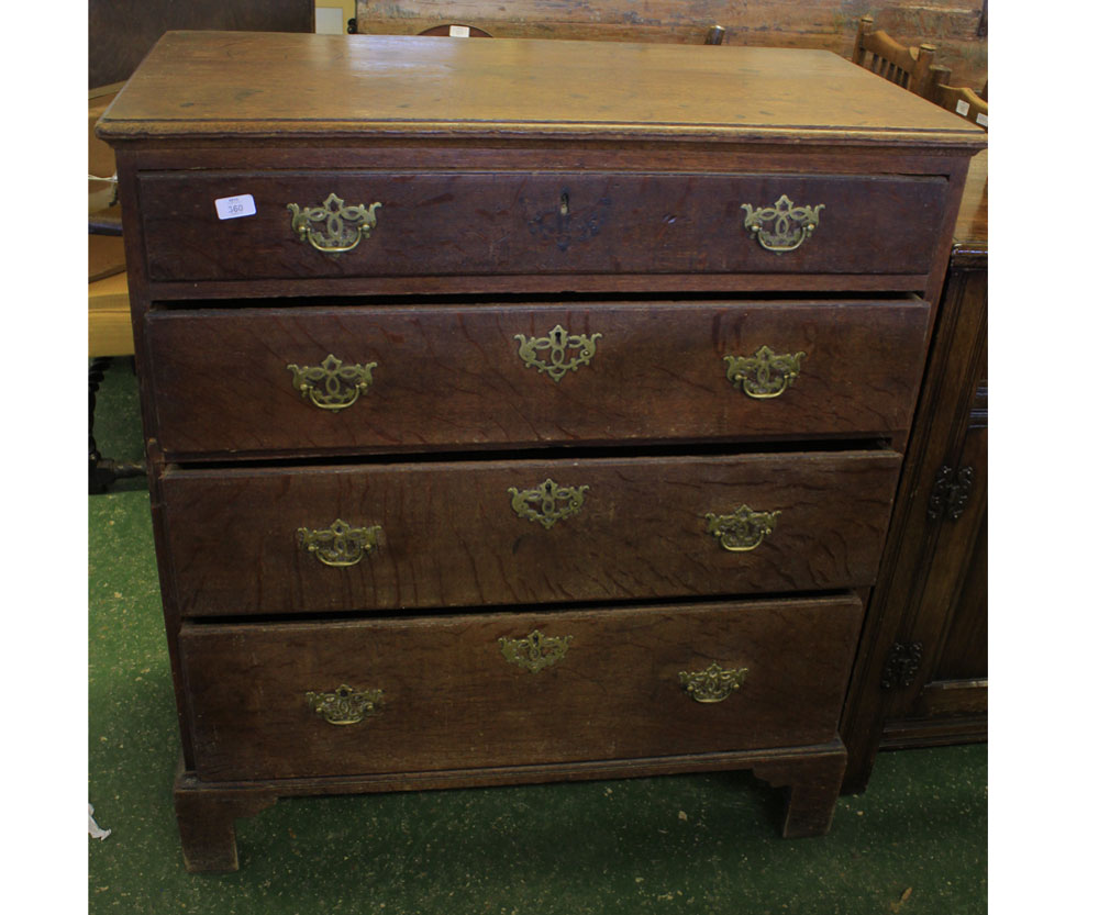 18th century oak four-drawer chest with brass handles and bracket feet