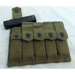 American WWII webbing magazine pouch, containing five Thompson SMG magazines and marked to the