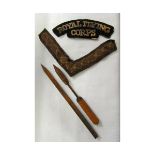 Mixed lot: Royal Flying Corps shoulder title, Lance Corporal stripe and two Flechette darts (4)