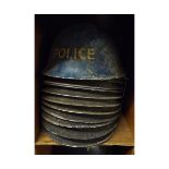 Twelve British MkIII steel helmets (all lacking liners and chin straps and showing signs of rust and