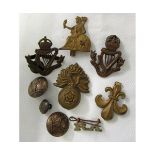 Mixed lot: various cap badges and buttons (11)