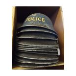 Twelve British MkIII steel helmets (all lacking liners and chin straps and showing signs of rust and