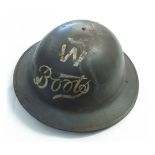 Mid-20th century British steel helmet, JSS, painted in iron grey and detailed with a W and the