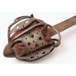 Late 18th/early 19th century Scottish basket-hilt broad sword, the shaped and pierced steel basket