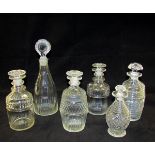 A mixed lot of six 19th century and later decanters includes two of mallet shape, two of barrel