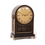 Mid-19th century ebonised and gilt brass mantel clock, signed Benjn Russell - Norwich, the arched