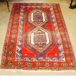 Caucasian rug, triple gull border, central panel of two interlinked lozenges, mainly red and blue