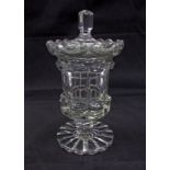 19th century lead crystal glass storage jar with faceted lift off cover over a geometrically faceted