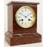 Late 19th century rouge marble mantel clock, Chas Frodsham, the plinth shaped case to a cast bezel