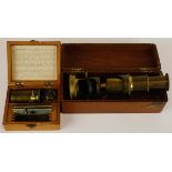 Mixed lot: mahogany cased brass student's microscope of cylindrical form with push sliding tube