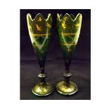 Pair of decorative Venetian style gilded green glass spill vases with castellated rims and the