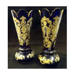 Pair of 19th century blue glass large spill vases with castellated gilded rims and the bodies