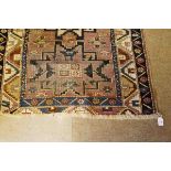 Caucasian small rug, triple gull border, central panel of cruciform and geometric designs, mainly