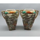 Pair of 20th century Noritake double handled vases decorated with continuous scenes, 7 1/2" high
